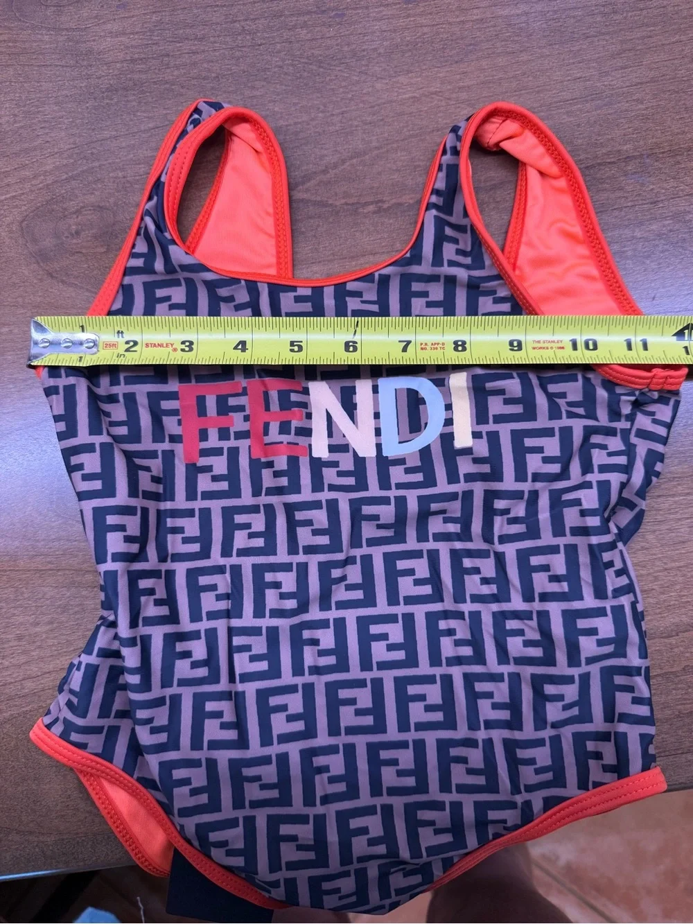 Fendi Kids Navy Monogram One-Piece Swimsuit with Orange Trim and Multicolor Logo